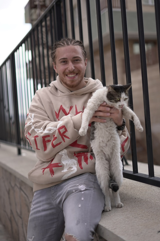 person holding a cat